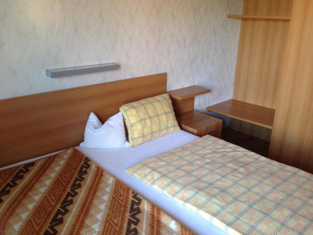 Postel nebo postele na pokoji v ubytování Winzerhof Klua Hoada