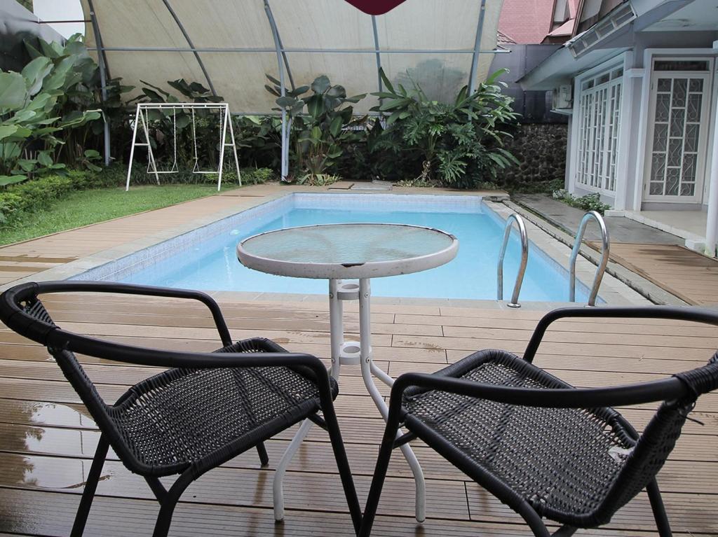 Bazén v ubytování Diyar Villas Puncak M3/47 nebo v jeho okolí