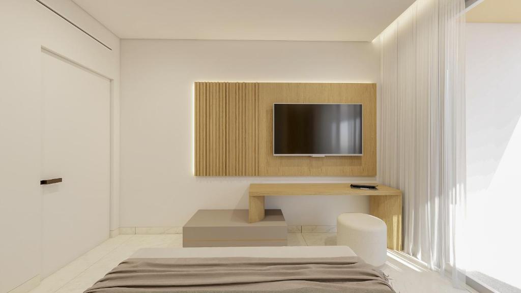 TV a/nebo společenská místnost v ubytování SANTA MARINA RESORT