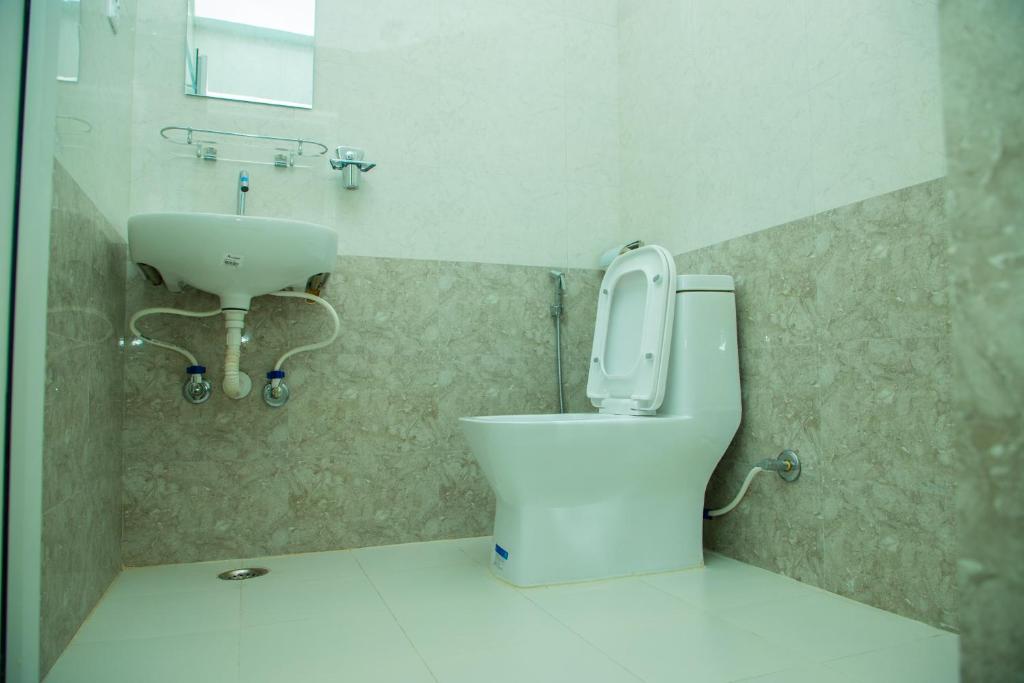 Baðherbergi á Hotel Pokhara Suites