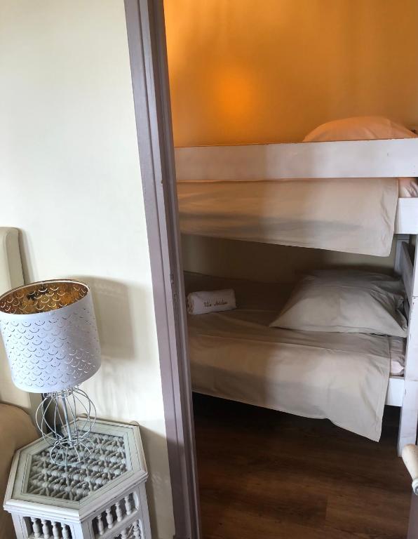 Postel nebo postele na pokoji v ubytování Villa Antoline