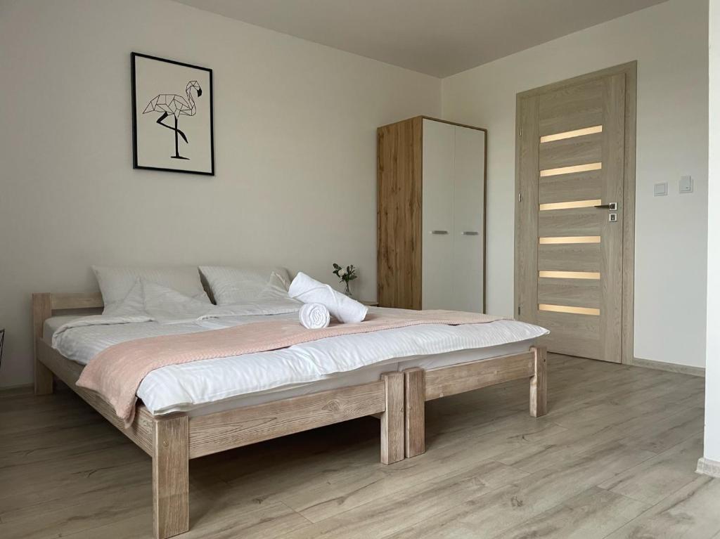 Posteľ alebo postele v izbe v ubytovaní Land House