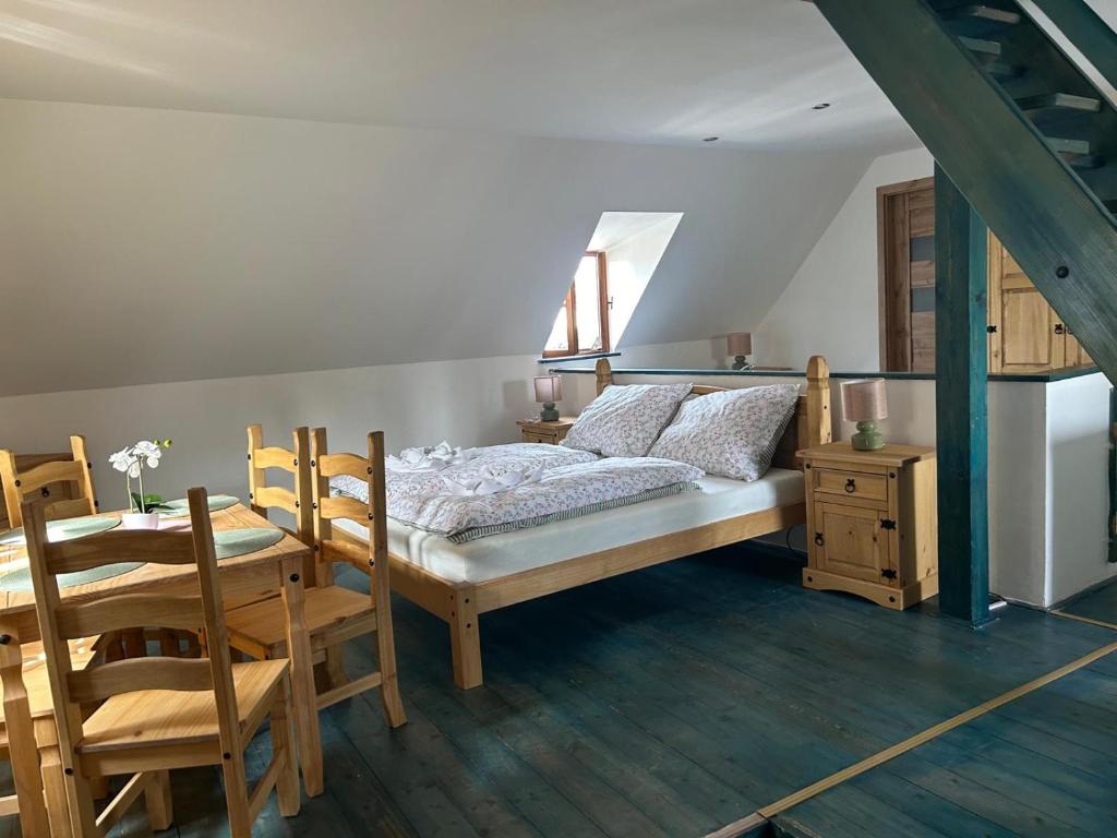 Postel nebo postele na pokoji v ubytování Hrad Vildstejn