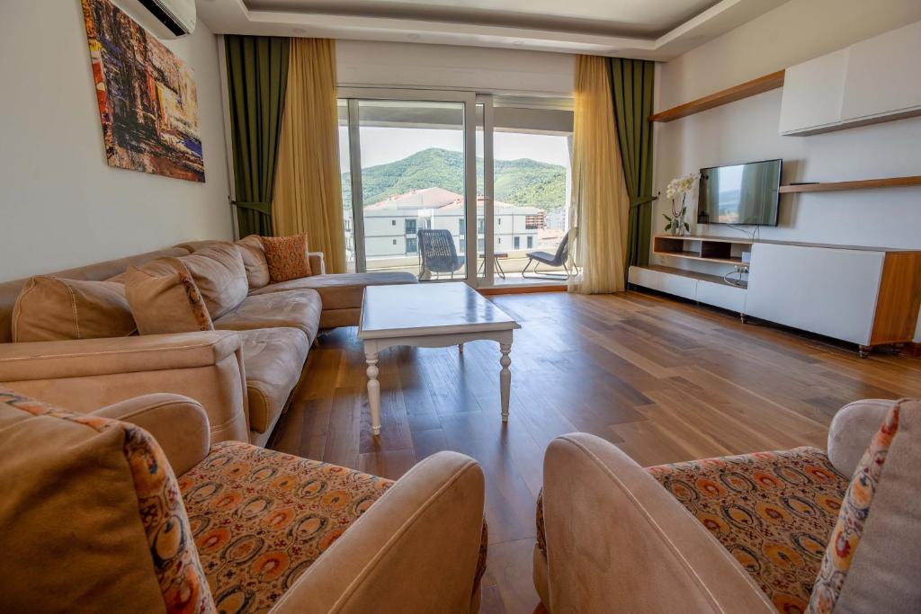 Posezení v ubytování New Chill and Go Apartments
