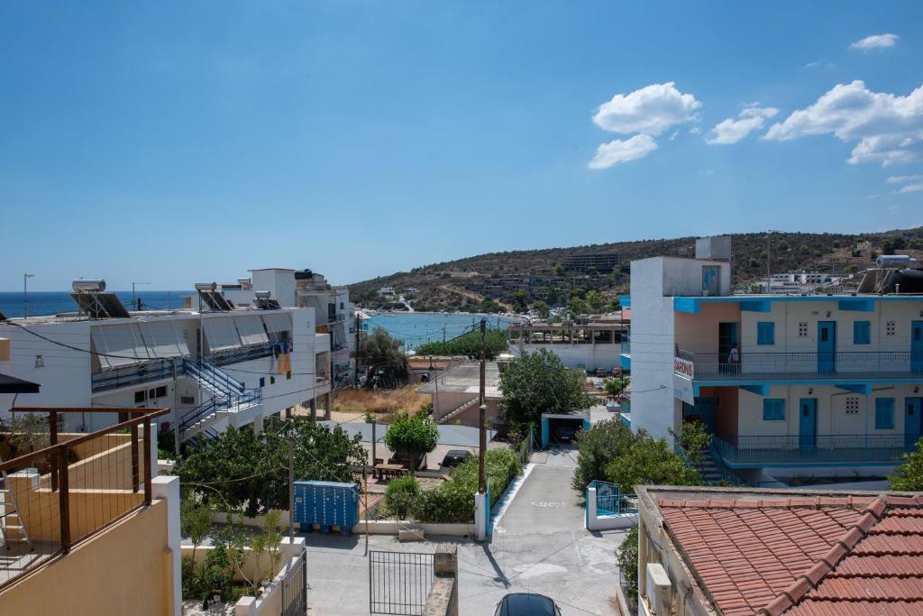a view of a city from a building at Elia Apartments in Agia Marina Aegina