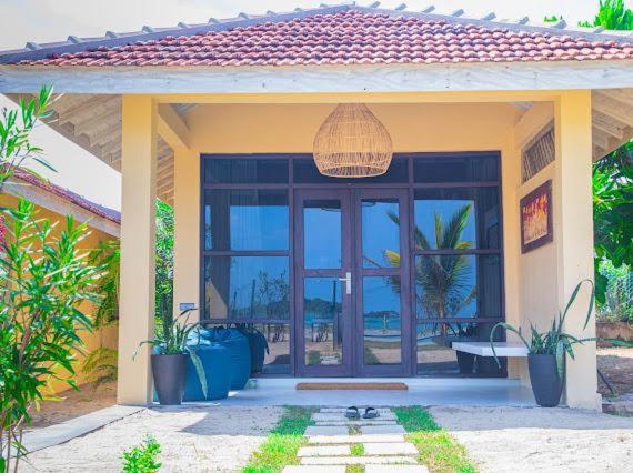 Zahrada ubytování Nikara Beach Villas Arugambay