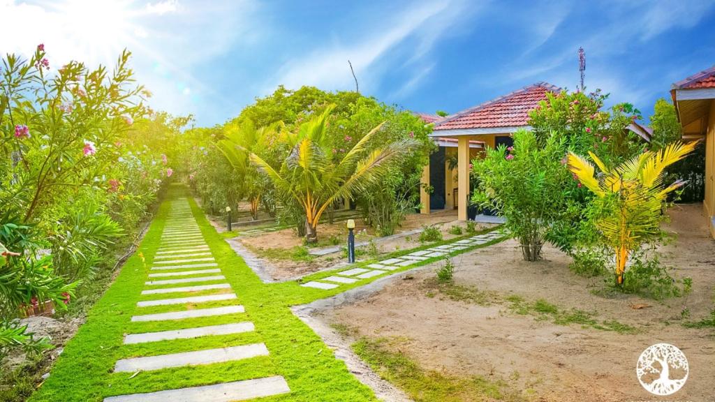 Zahrada ubytování Nikara Beach Villas Arugambay