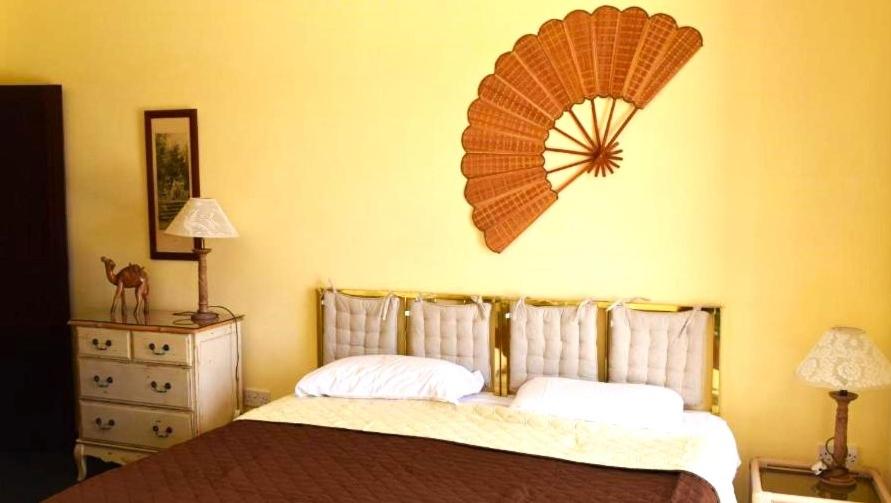 Katil atau katil-katil dalam bilik di Gmiel in-Natura B&B