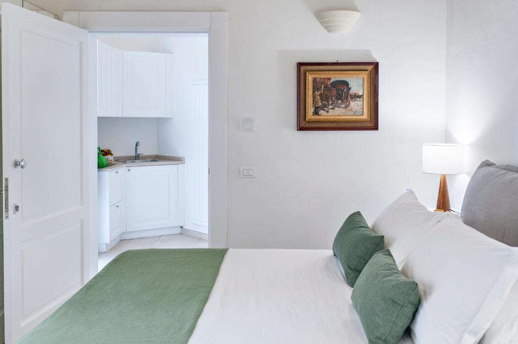 Postel nebo postele na pokoji v ubytování Tancredi Suites - Lecce Selection