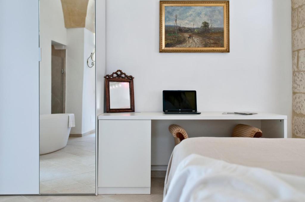 Postel nebo postele na pokoji v ubytování Tancredi Suites - Lecce Selection