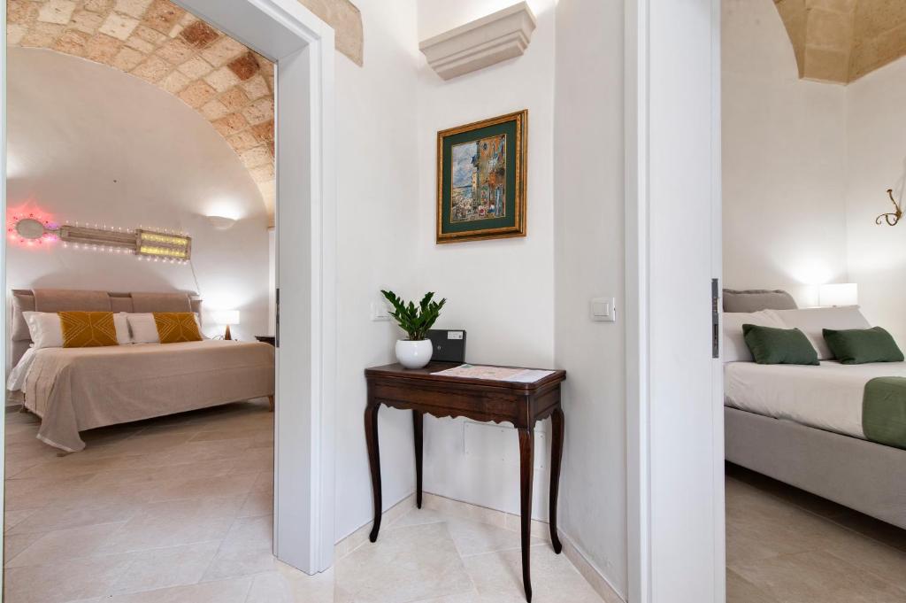 Postel nebo postele na pokoji v ubytování Tancredi Suites - Lecce Selection