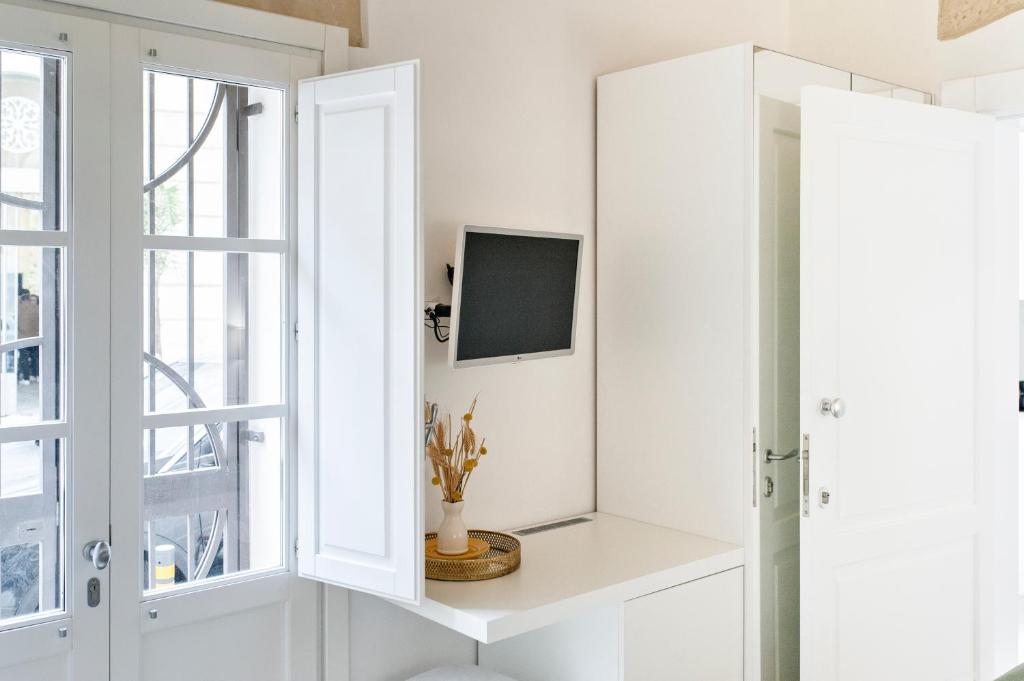 TV a/nebo společenská místnost v ubytování Tancredi Suites - Lecce Selection
