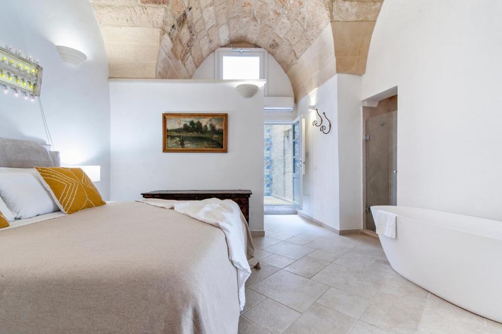 Postel nebo postele na pokoji v ubytování Tancredi Suites - Lecce Selection