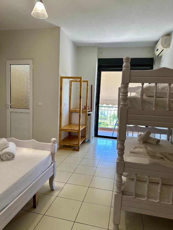 Postel nebo postele na pokoji v ubytování Bora Rooms