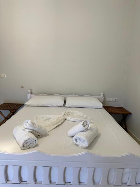 Postel nebo postele na pokoji v ubytování Bora Rooms