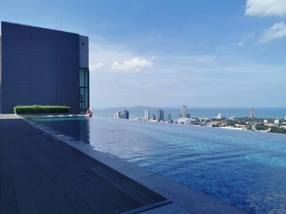 a swimming pool on the roof of a building at Infinity Pool at Pattaya Posh in North Pattaya