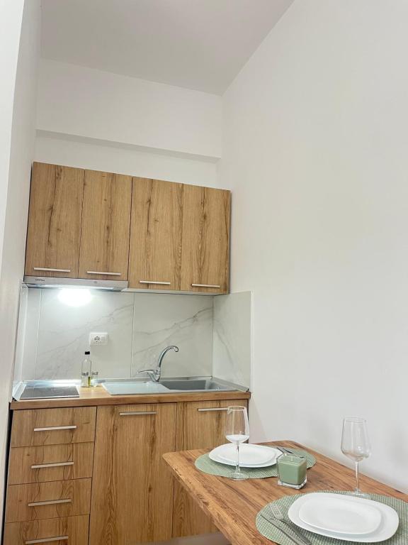 Kuchyň nebo kuchyňský kout v ubytování Blossom Apartments