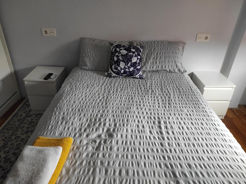 מיטה או מיטות בחדר ב-dormitorio bego