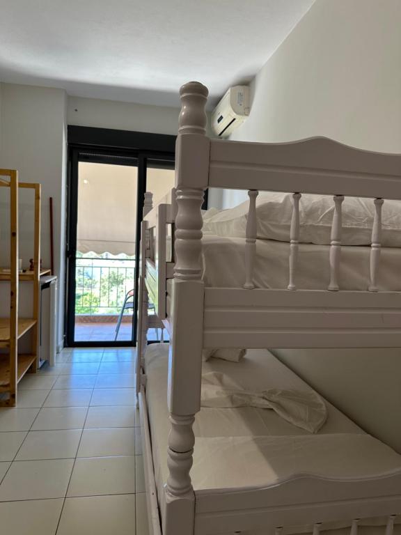 Postel nebo postele na pokoji v ubytování Bora Rooms