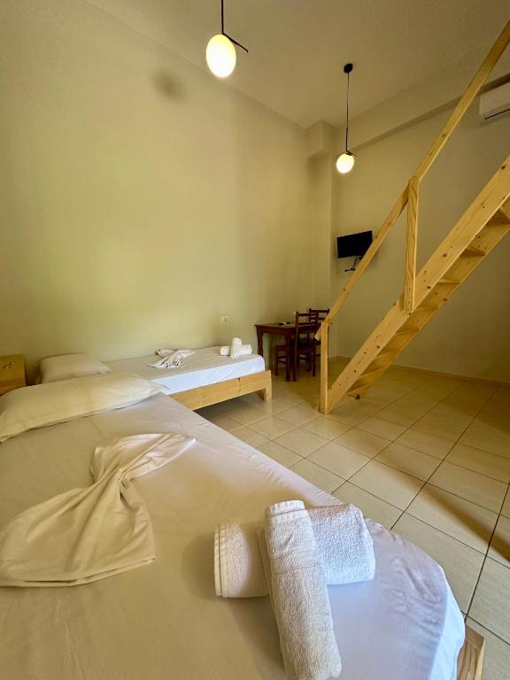 Postel nebo postele na pokoji v ubytování Bora Rooms