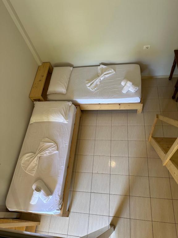 Postel nebo postele na pokoji v ubytování Bora Rooms