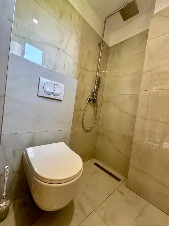 Koupelna v ubytování Bora Rooms