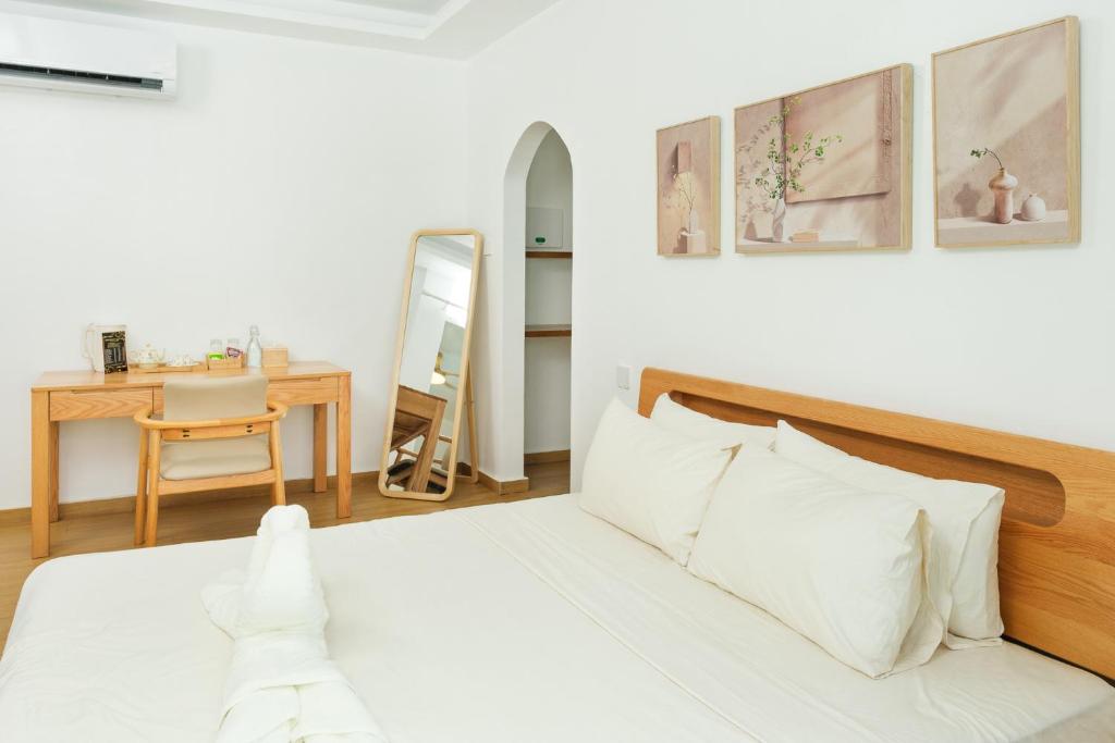Uma cama ou camas num quarto em Seapearl of Alona