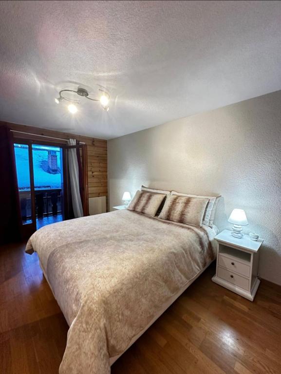 Postel nebo postele na pokoji v ubytování Appartement 4 p Centre Villars