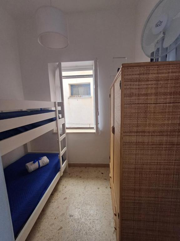 Postel nebo postele na pokoji v ubytování Le due conchiglie