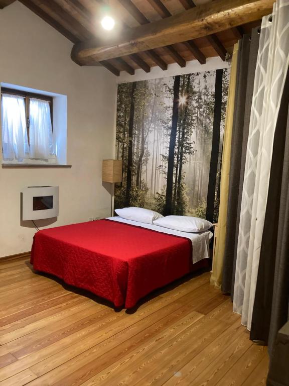 Postel nebo postele na pokoji v ubytování Badia Antica