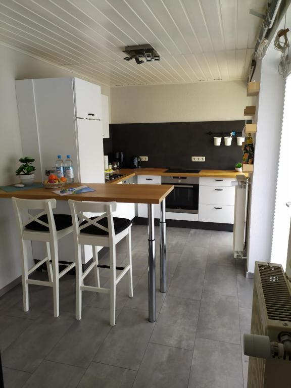 Una cocina o zona de cocina en Apartment am Denkmal