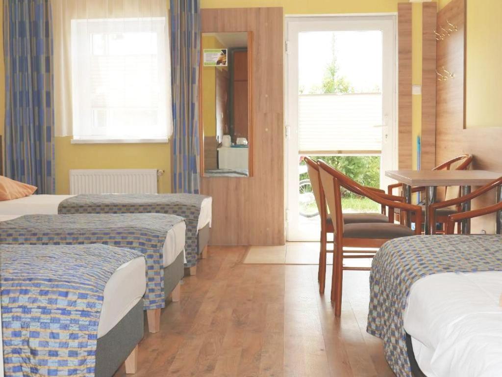 Postel nebo postele na pokoji v ubytování Reda