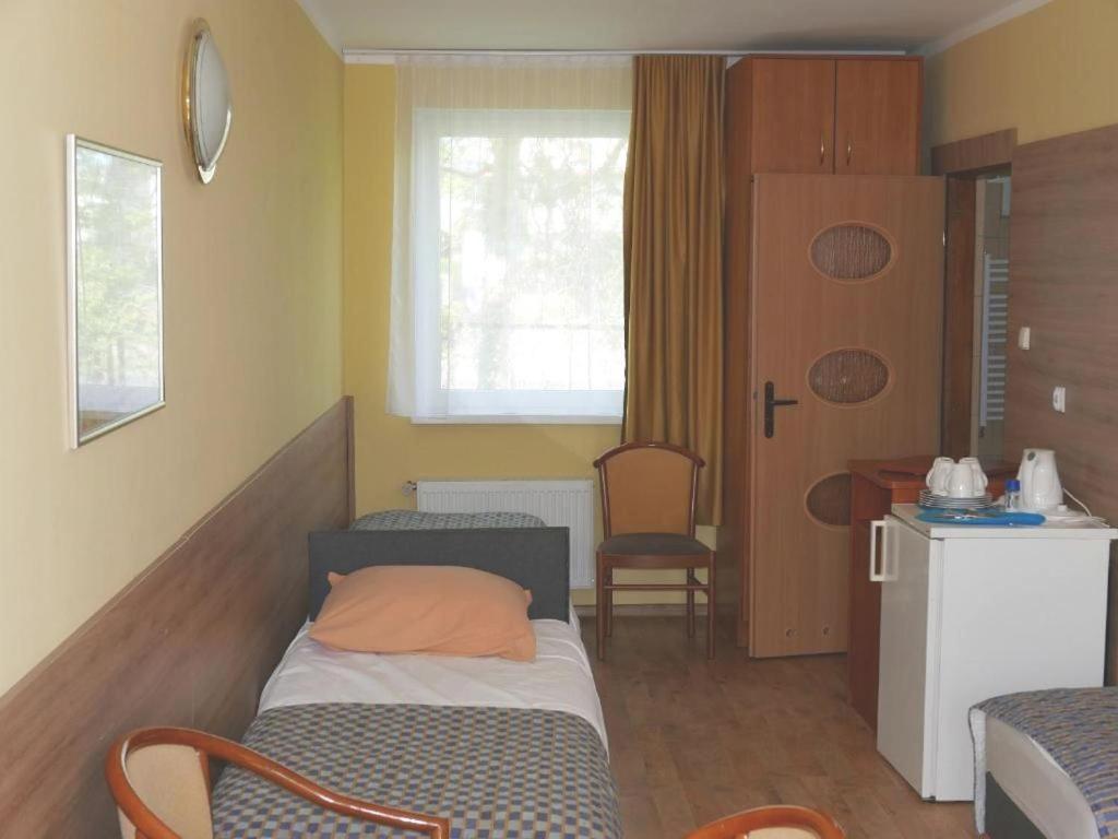Postel nebo postele na pokoji v ubytování Reda