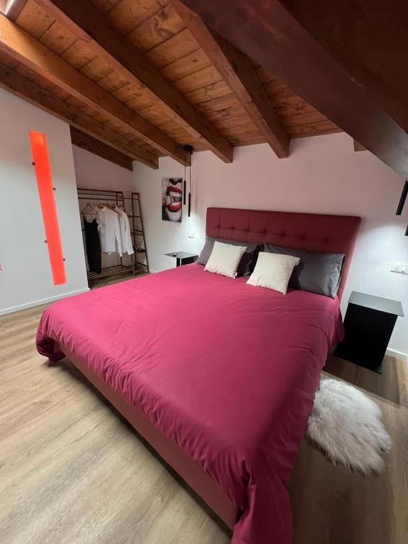 Postel nebo postele na pokoji v ubytování Abitare il Tempo-Elegante e Moderno-ad 1 bus da Roma