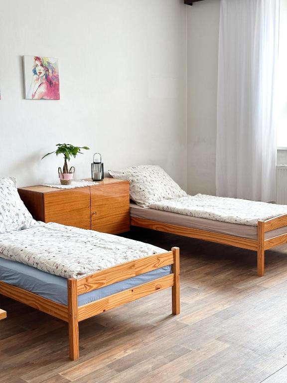 Postel nebo postele na pokoji v ubytování Apartmán JP