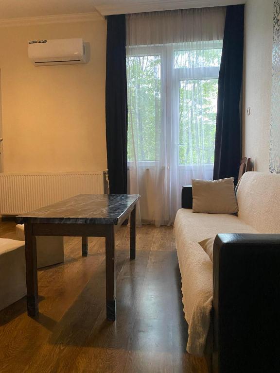Postel nebo postele na pokoji v ubytování guest house Telavi XXI
