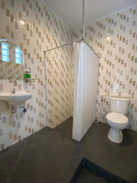 Koupelna v ubytování Hotel Bima Majalengka