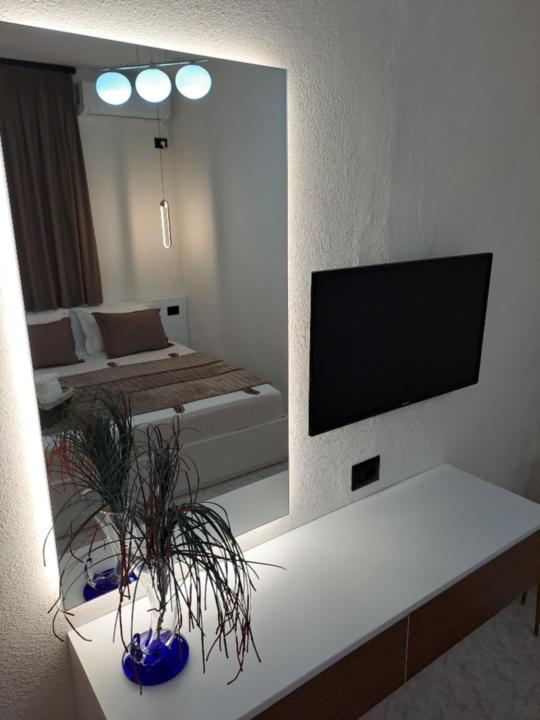 TV a/nebo společenská místnost v ubytování Manga guesthouse