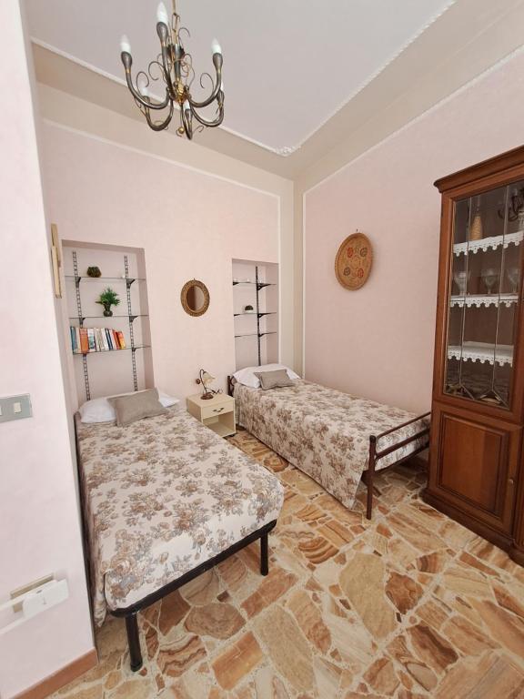 Postel nebo postele na pokoji v ubytování Da Isa
