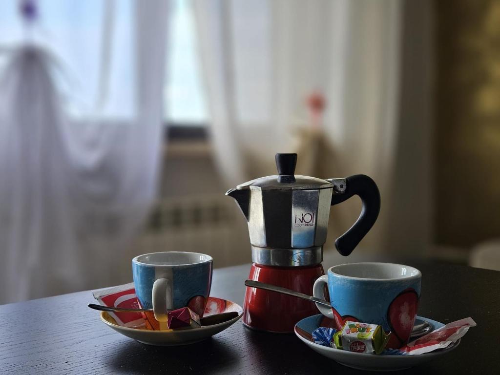 Coffee and tea making facilities at Appartamento Divino Tramonto