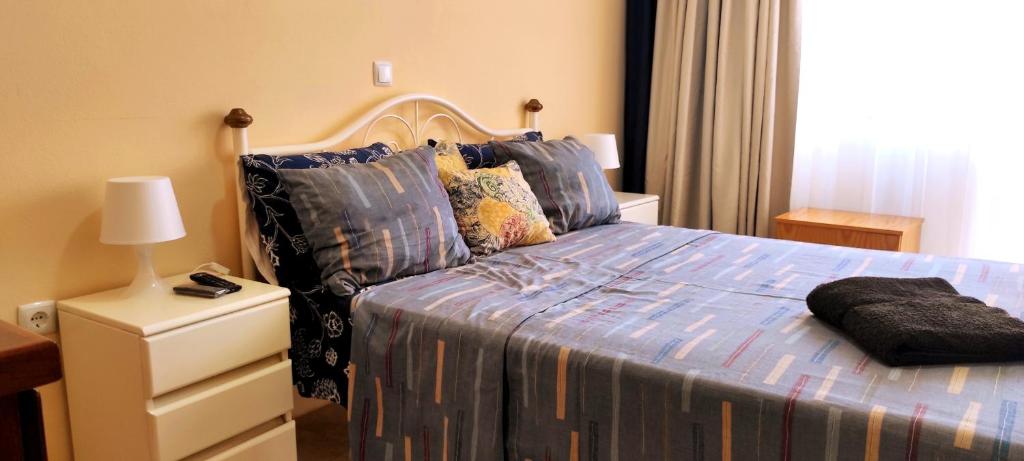 Postel nebo postele na pokoji v ubytování guesthouse emaly