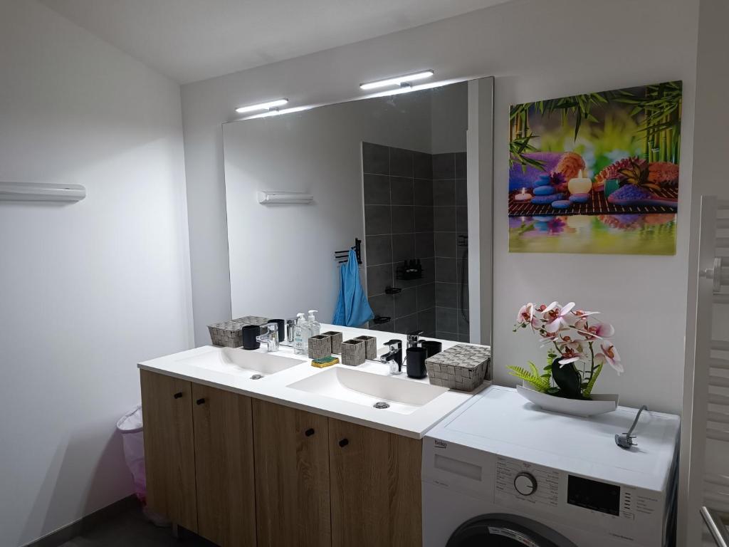 Kuchyň nebo kuchyňský kout v ubytování Mimizan Apt neuf 80m2 +terrasse 100m plage