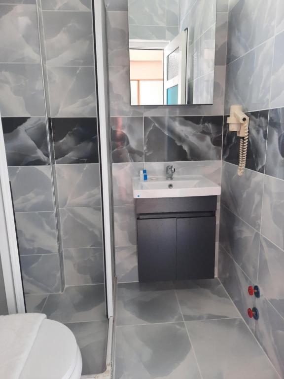 Koupelna v ubytování Uyum Hotel