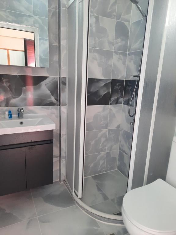 Koupelna v ubytování Uyum Hotel