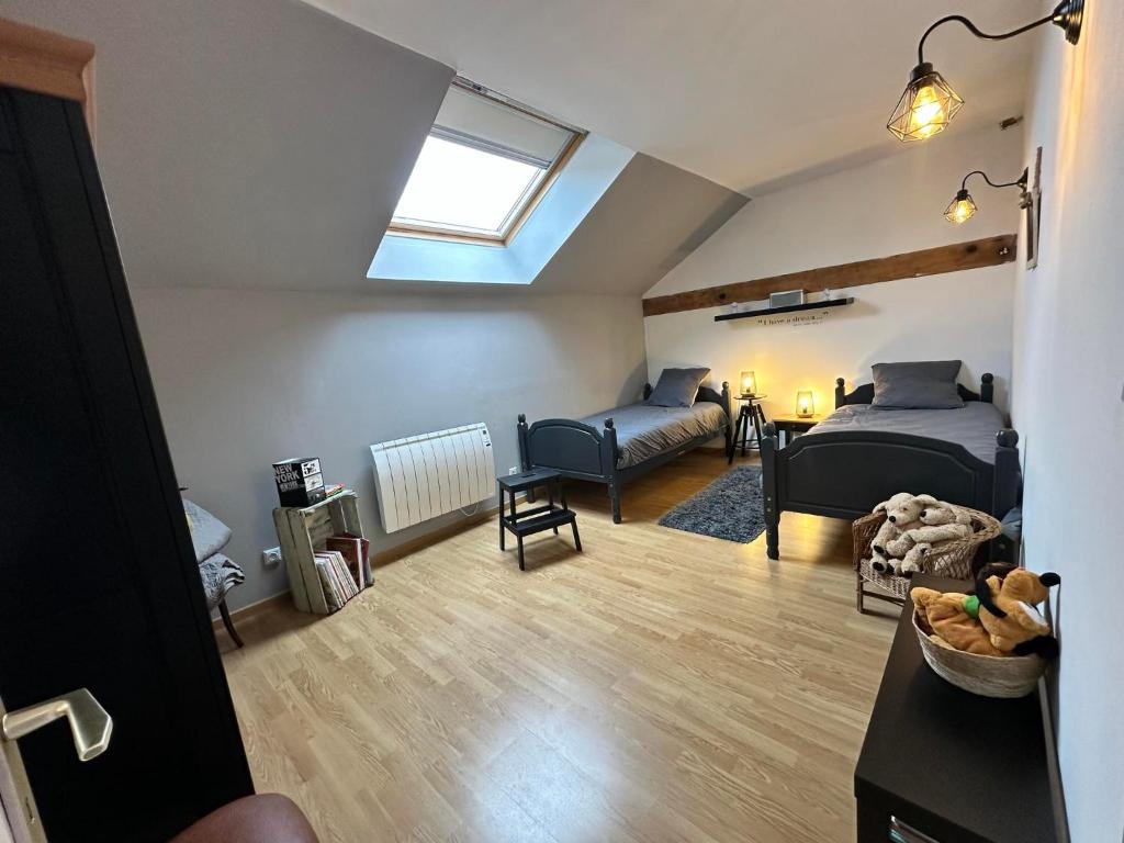 Postel nebo postele na pokoji v ubytování Gîte Cosy Green
