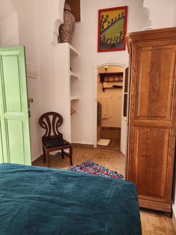 Postel nebo postele na pokoji v ubytování Dar Adul