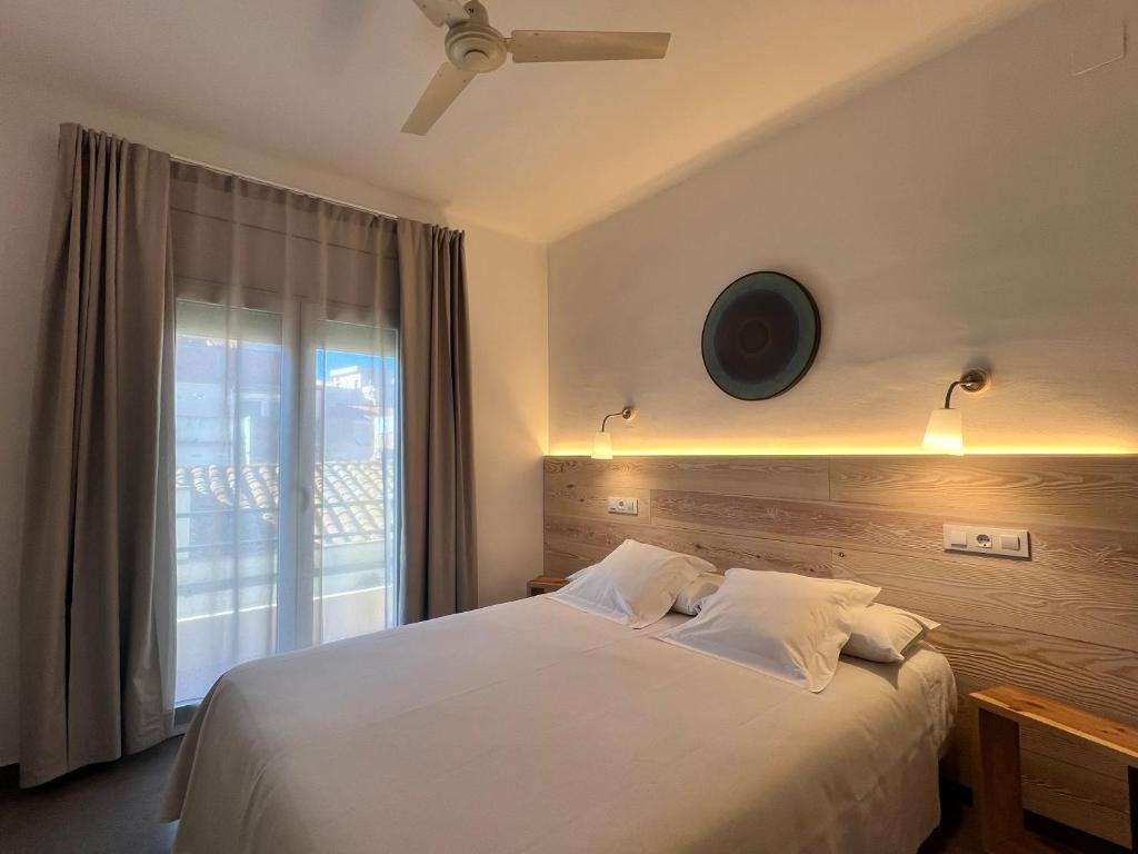 Posteľ alebo postele v izbe v ubytovaní Hostal ROM Familiar