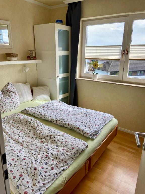 Postel nebo postele na pokoji v ubytování Ostseeliebe
