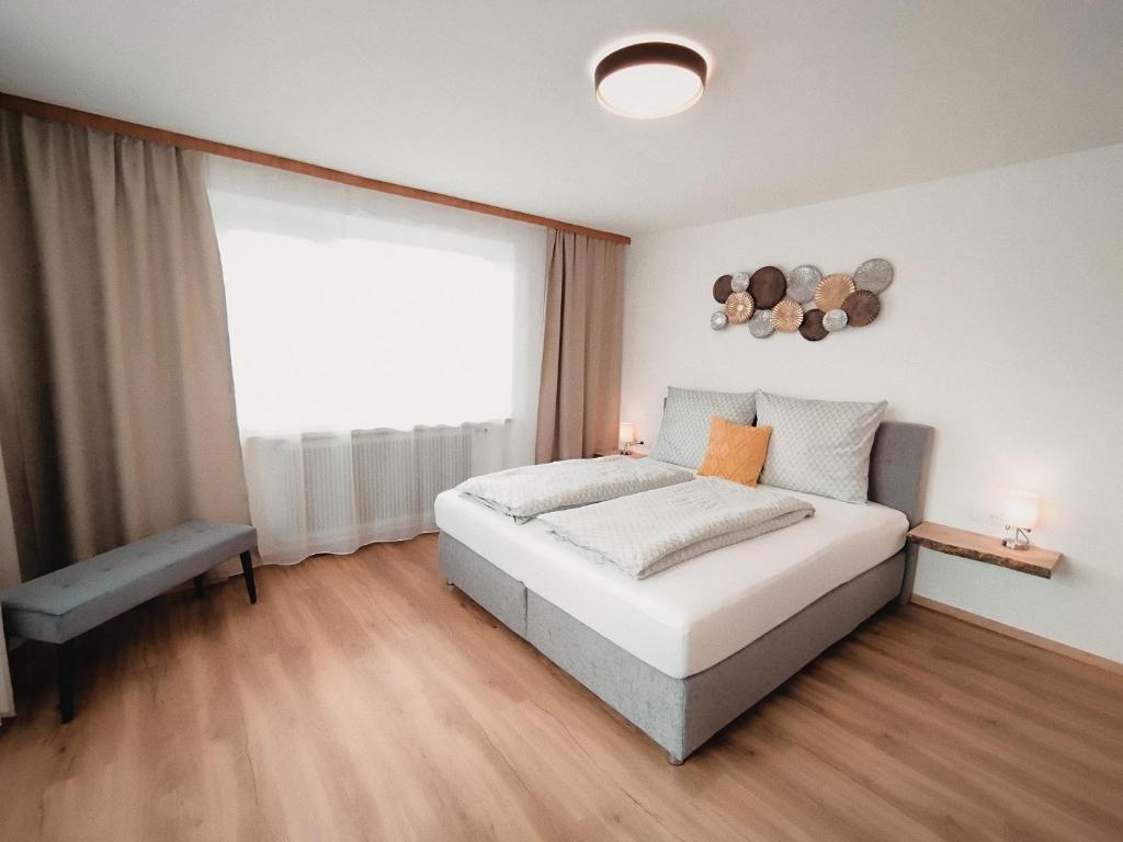 Posteľ alebo postele v izbe v ubytovaní Carina's Apartment