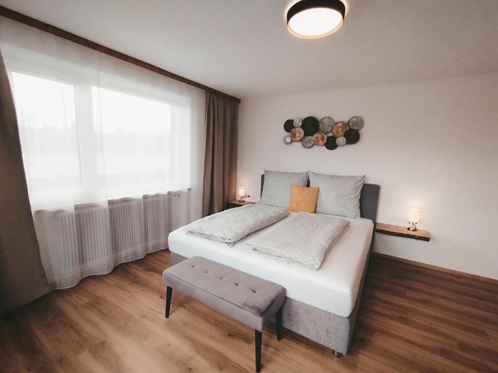 Posteľ alebo postele v izbe v ubytovaní Carina's Apartment